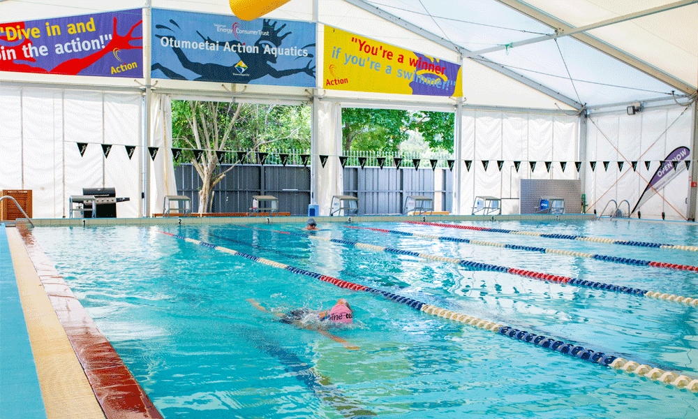 Otumoetai lap pool with swimmers practicing